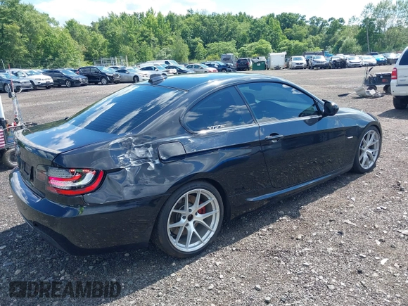 2011 BMW 3 Series 335i xDrive with VIN WBAKF9C56BE247125, listed as a IAAI auction lot 39738395 with 144,405 mi miles. Bid and sale history available at carsss.com. Image 4.