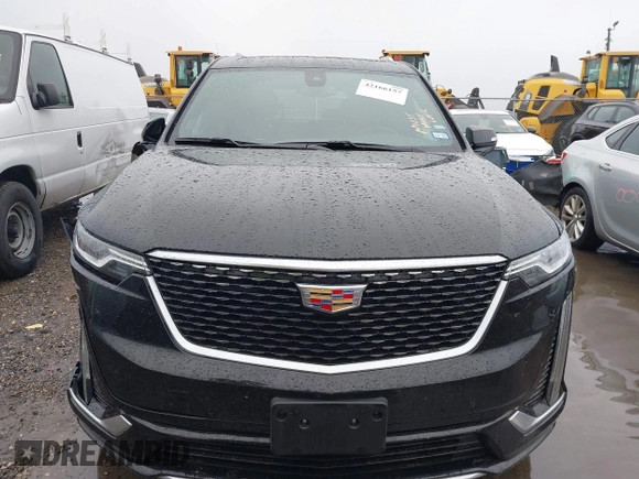 2025 Cadillac XT6 FWD Premium Luxury with VIN 1GYKPCRS3SZ120054, listed as a IAAI auction lot 42166157 with 16,280 mi miles and . Bid and sale history available at DreamBid. Image 12.
