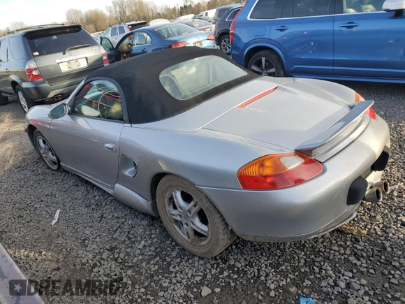 2000 Porsche Boxster z VIN WP0CA2980YU626179, wystawiony jako Copart lot #44728325 z przebiegiem 103 173 mil mil oraz Szkody całkowita. Historia ofert i sprzedaży dostępna na DreamBid. Obrazek 2.