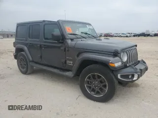 2020 Jeep Wrangler Unlimited Sahara with VIN 1C4HJXENXLW148140, listed as a Copart auction lot 43897435 with 104,411 mi miles and Salvage Title. Bid and sale history available at carsss.com. Image 4.
