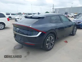 2024 Kia EV6 Light z VIN KNDC34LB7R5616772, wystawiony jako IAAI lot #42133260 z przebiegiem 10 415 mil mil oraz . Historia ofert i sprzedaży dostępna na DreamBid. Obrazek 4.