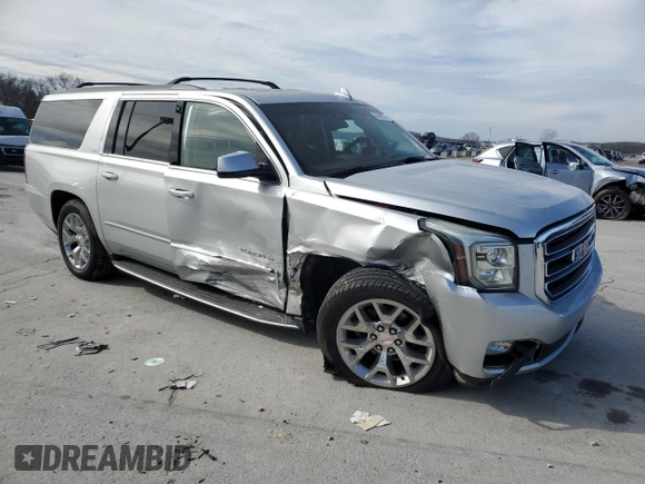 2015 GMC Yukon XL SLT with VIN 1GKS2HKC8FR650082, listed as a Copart auction lot 45049375 with 222,200 mi miles and Salvage Title. Bid and sale history available at carsss.com. Image 4.
