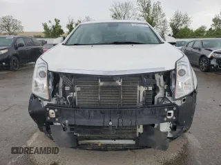 2012 Cadillac SRX Luxury Collection z VIN 3GYFNAE34CS648291, wystawiony jako Copart lot #55090415 z przebiegiem 103 286 mil mil oraz Szkoda całkowita • Salvage title. Historia ofert i sprzedaży dostępna na DreamBid. Obrazek 5.