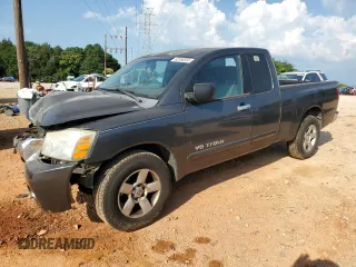 2006 Nissan Titan SE with VIN 1N6BA06AX6N550062, listed as a Copart auction lot 62350055 with 317,991 mi miles and Salvage title. Bid and sale history available at DreamBid. Image 1.