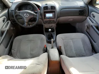 2002 Mazda Protege DX with VIN JM1BJ225120605237, listed as a Copart auction lot 49331225 with 184,556 mi miles and Salvage Title. Bid and sale history available at DreamBid. Image 8.
