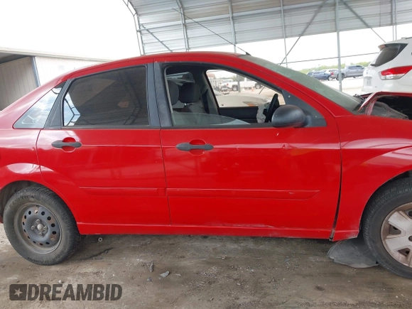 2007 Ford Focus S z VIN 1FAFP34N07W282022, wystawiony jako IAAI lot #42126281 z przebiegiem Nie podano mil oraz . Historia ofert i sprzedaży dostępna na DreamBid. Obrazek 13.