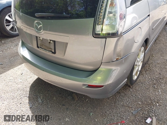 2010 Mazda 5 Sport with VIN JM1CR2W31A0384307, listed as a IAAI auction lot 42305589 with 144,372 mi miles and . Bid and sale history available at DreamBid. Image 12.