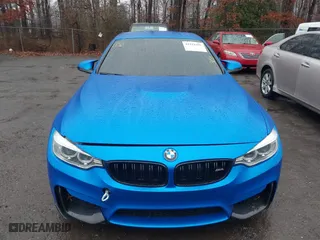 2015 BMW M4 with VIN WBS3U9C5XFJ968082, listed as a IAAI auction lot 41513593 with 57,715 mi miles. Bid and sale history available at carsss.com. Image 12.