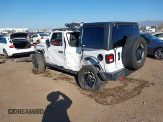 2019 Jeep Wrangler Unlimited Rubicon with VIN 1C4HJXFN7KW505383, listed as a IAAI auction lot 41220907 with 53,578 mi miles and . Bid and sale history available at DreamBid. Image 3.