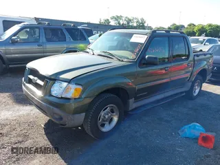 2001 Ford Explorer Sport Trac z VIN 1FMZU67E61UC97894, wystawiony jako IAAI lot #42636012 z przebiegiem 167 633 mil mil oraz . Historia ofert i sprzedaży dostępna na DreamBid. Obrazek 2.
