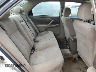 2001 Toyota Camry CE z VIN JT2BG22KX10564294, wystawiony jako Copart lot #53317505 z przebiegiem 227 358 mil mil oraz Szkoda całkowita • Salvage title. Historia ofert i sprzedaży dostępna na DreamBid. Obrazek 10.