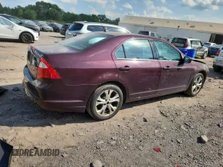 2012 Ford Fusion SE z VIN 3FAHP0HA7CR387524, wystawiony jako Copart lot #62083235 z przebiegiem 104 698 mil mil oraz Szkoda całkowita • Salvage title. Historia ofert i sprzedaży dostępna na DreamBid. Obrazek 3.