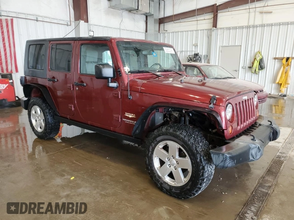 2008 Jeep Wrangler Unlimited Sahara z VIN 1J4GA59198L570409, wystawiony jako Copart lot #58853295 z przebiegiem 84 502 mil mil oraz Nie do naprawy • Non repairable. Historia ofert i sprzedaży dostępna na DreamBid. Obrazek 4.