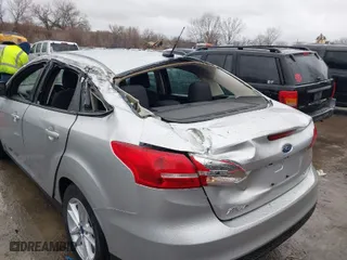 2018 Ford Focus SE with VIN 1FADP3F20JL306628, listed as a IAAI auction lot 41835004 with 28,070 mi miles. Bid and sale history available at carsss.com. Image 6.