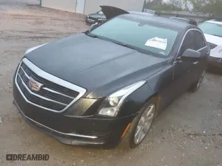 2015 Cadillac ATS Luxury with VIN 1G6AB5R35F0121403, listed as a IAAI auction lot 41823829 with 194,632 mi miles. Bid and sale history available at carsss.com. Image 2.