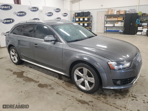 2015 Audi allroad Premium Plus with VIN WA1UFAFL4FA008087, listed as a Copart auction lot 50877515 with 128,468 mi miles and Salvage Title. Bid and sale history available at carsss.com. Image 4.