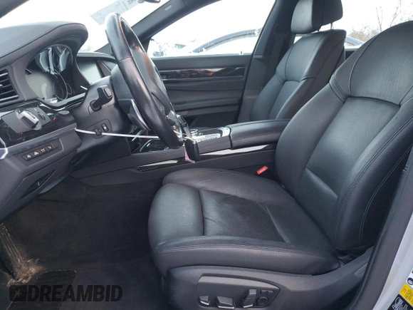 2014 BMW 7 Series 740Li xDrive with VIN WBAYF4C57ED281954, listed as a Copart auction lot 85297394 with 63,535 mi miles and Salvage Title. Bid and sale history available at carsss.com. Image 7.
