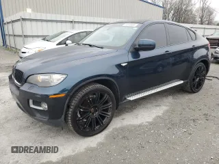 2014 BMW X6 xDrive35i with VIN 5UXFG2C57E0C43953, listed as a Copart auction lot 44595885 with 121,208 mi miles and Clean Title. Bid and sale history available at carsss.com. Image 1.