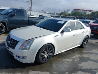 2010 Cadillac CTS with VIN 1G6DK5EVXA0102844, listed as a IAAI auction lot 41818267 with 127,517 mi miles and . Bid and sale history available at DreamBid. Image 18.