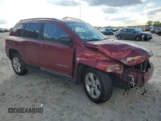 2011 Jeep Compass with VIN 1J4NT1FB4BD194839, listed as a Copart auction lot 73001014 with 113,050 mi miles and Salvage Title. Bid and sale history available at carsss.com. Image 4.