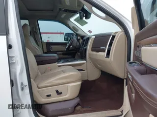 2014 Ram 2500 with VIN 3C6TR5KT3EG309771, listed as a IAAI auction lot 41213964 with 136,617 mi miles and . Bid and sale history available at DreamBid. Image 5.