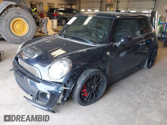 2008 MINI Hardtop S with VIN WMWMF73568TT87273, listed as a IAAI auction lot 41996859 with 107,671 mi miles and . Bid and sale history available at DreamBid. Image 18.