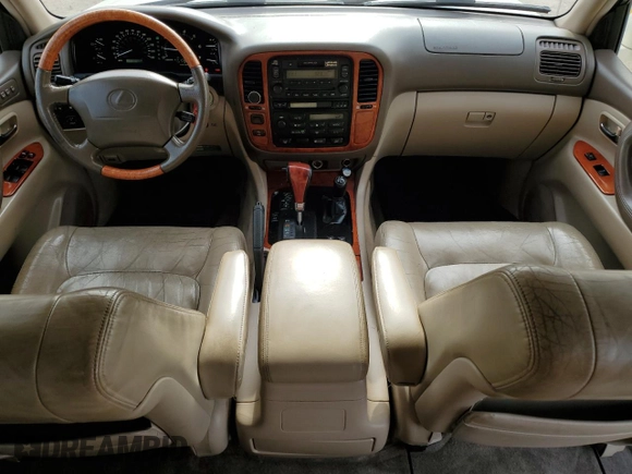 2000 Lexus LX 470 z VIN JT6HT00W8Y0126253, wystawiony jako Copart lot #49400665 z przebiegiem 181 328 mil mil oraz Szkody całkowita. Historia ofert i sprzedaży dostępna na DreamBid. Obrazek 8.