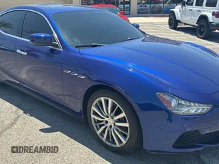 2016 Maserati Ghibli with VIN ZAM57XSA0G1173808, listed as a Copart auction lot 62913645 with 70,097 mi miles and Clean title. Bid and sale history available at DreamBid. Image 1.