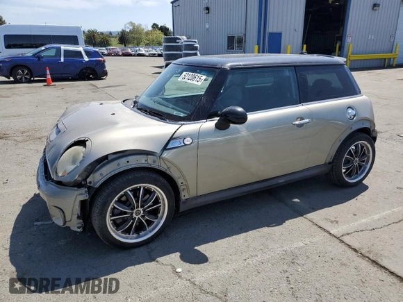 2009 MINI Hardtop S with VIN WMWMF73549TT94143, listed as a Copart auction lot 52120615 with 144,334 mi miles and Salvage Title. Bid and sale history available at DreamBid. Image 1.