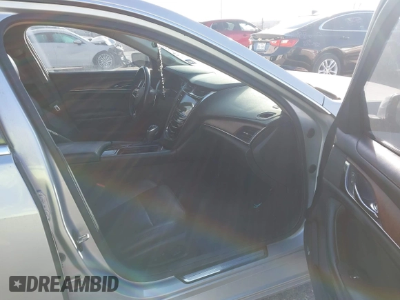 2019 Cadillac CTS Luxury RWD with VIN 1G6AR5SX7K0110826, listed as a IAAI auction lot 41596118 with 58,387 mi miles and . Bid and sale history available at DreamBid. Image 5.