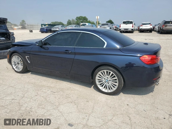 2015 BMW 4 Series 428i xDrive with VIN WBA3T1C55FP820640, listed as a Copart auction lot 60394605 with 111,288 mi miles and Salvage title. Bid and sale history available at DreamBid. Image 2.