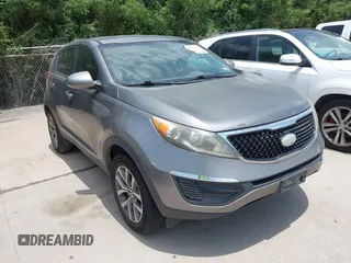 2014 Kia Sportage LX with VIN KNDPB3AC5E7639802, listed as a IAAI auction lot 42551086 with 214,188 mi miles and . Bid and sale history available at DreamBid. Image 1.
