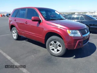 2008 Suzuki Grand Vitara w/Spare & Cargo Covers z VIN JS3TD941084101215, wystawiony jako IAAI lot #42154547 z przebiegiem 141 851 mil mil oraz . Historia ofert i sprzedaży dostępna na DreamBid. Obrazek 1.