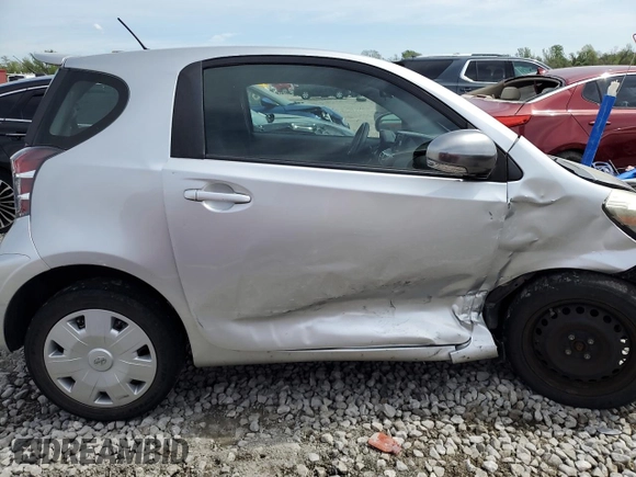 2012 Scion iQ with VIN JTNJJXB03CJ015321, listed as a Copart auction lot 54332355 with 63,439 mi miles and Salvage title. Bid and sale history available at DreamBid. Image 10.