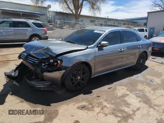 2015 Volkswagen Passat SE with VIN 1VWBS7A35FC014128, listed as a Copart auction lot 51010485 with 154,263 mi miles and Salvage title. Bid and sale history available at DreamBid. Image 1.