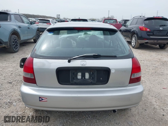 2000 Honda Civic DX z VIN 2HGEJ644XYH104197, wystawiony jako IAAI lot #42005938 z przebiegiem 125 321 mil mil oraz . Historia ofert i sprzedaży dostępna na DreamBid. Obrazek 17.