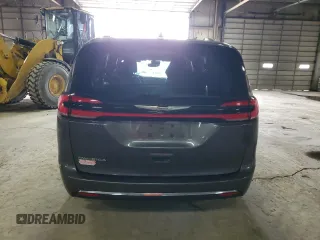 2021 Chrysler Pacifica Touring L with VIN 2C4RC1BGXMR588001, listed as a Copart auction lot 54562505 with 128,350 mi miles and Salvage title. Bid and sale history available at DreamBid. Image 6.