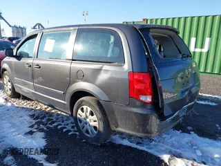 2016 Dodge Grand Caravan SE with VIN 2C4RDGBG1GR211030, listed as a IAAI auction lot 41386099 with 73,244 mi miles and . Bid and sale history available at DreamBid. Image 3.