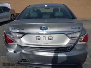 2013 Hyundai Sonata Hybrid with VIN KMHEC4A42DA089524, listed as a IAAI auction lot 41233221 with 114,636 mi miles. Bid and sale history available at carsss.com. Image 6.