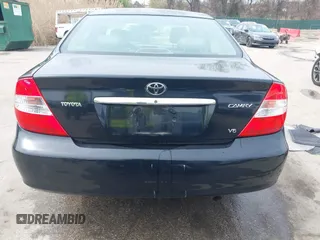 2004 Toyota Camry LE with VIN 4T1BF30K34U080477, listed as a IAAI auction lot 41956998 with 135,441 mi miles. Bid and sale history available at carsss.com. Image 16.