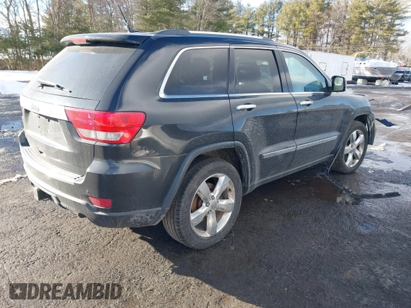 2013 Jeep Grand Cherokee Overland with VIN 1C4RJFCT3DC636378, listed as a IAAI auction lot 41477415 with 147,651 mi miles. Bid and sale history available at carsss.com. Image 4.
