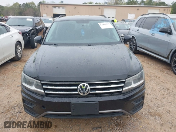 2018 Volkswagen Tiguan S with VIN 3VV0B7AX4JM098495, listed as a IAAI auction lot 41937757 with 179,168 mi miles and . Bid and sale history available at DreamBid. Image 12.