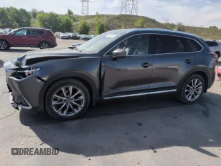 2019 Mazda CX-9 Signature with VIN JM3TCBEY7K0305326, listed as a Copart auction lot 58205005 with 79,864 mi miles and Salvage title. Bid and sale history available at DreamBid. Image 1.