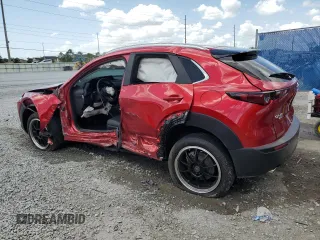 2023 Mazda CX-30 S Carbon Edition с VIN 3MVDMBCM0PM533469, выставлен на аукционе Copart как лот 52646155 с пробегом 22 636 миль миль и На запчасти • Non repairable. История ставок и продаж доступна на DreamBid. Изображение 2.