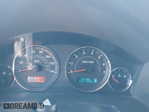 2007 Jeep Commander Sport z VIN 1J8HH48P97C619556, wystawiony jako IAAI lot #42343720 z przebiegiem 152 647 mil mil oraz . Historia ofert i sprzedaży dostępna na DreamBid. Obrazek 7.