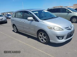 2009 Mazda 5 Sport with VIN JM1CR293990334438, listed as a IAAI auction lot 42561953 with 118,178 mi miles and . Bid and sale history available at DreamBid. Image 1.