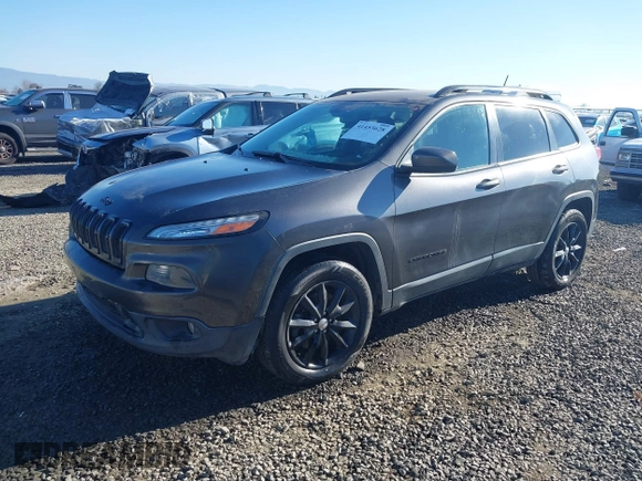 2014 Jeep Cherokee Latitude with VIN 1C4PJMCB5EW294631, listed as a IAAI auction lot 41453628 with 127,847 mi miles and . Bid and sale history available at DreamBid. Image 2.