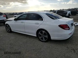 2018 Mercedes-Benz E-Class E 300 with VIN WDDZF4JB2JA310066, listed as a Copart auction lot 41464505 with 76,389 mi miles and Salvage Title. Bid and sale history available at carsss.com. Image 2.
