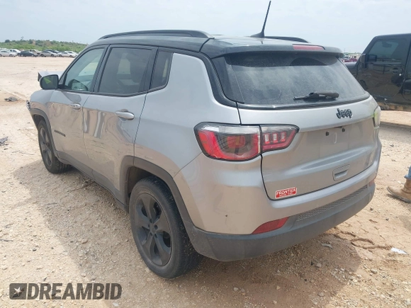 2018 Jeep Compass Latitude with VIN 3C4NJCBBXJT494116, listed as a IAAI auction lot 42150992 with 96,125 mi miles and . Bid and sale history available at DreamBid. Image 3.