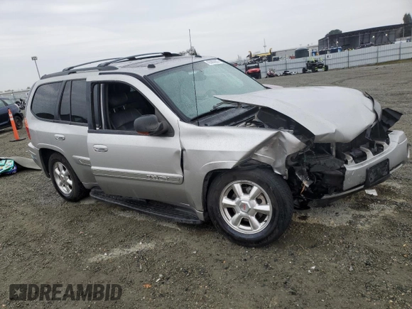 2004 GMC Envoy SLE with VIN 1GKDS13S142358446, listed as a Copart auction lot 43383935 with 154,358 mi miles and Salvage Title. Bid and sale history available at carsss.com. Image 4.